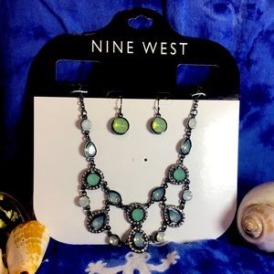 Nine West 16in. silver tone w/ blue/green stones. Necklace and earrings set.